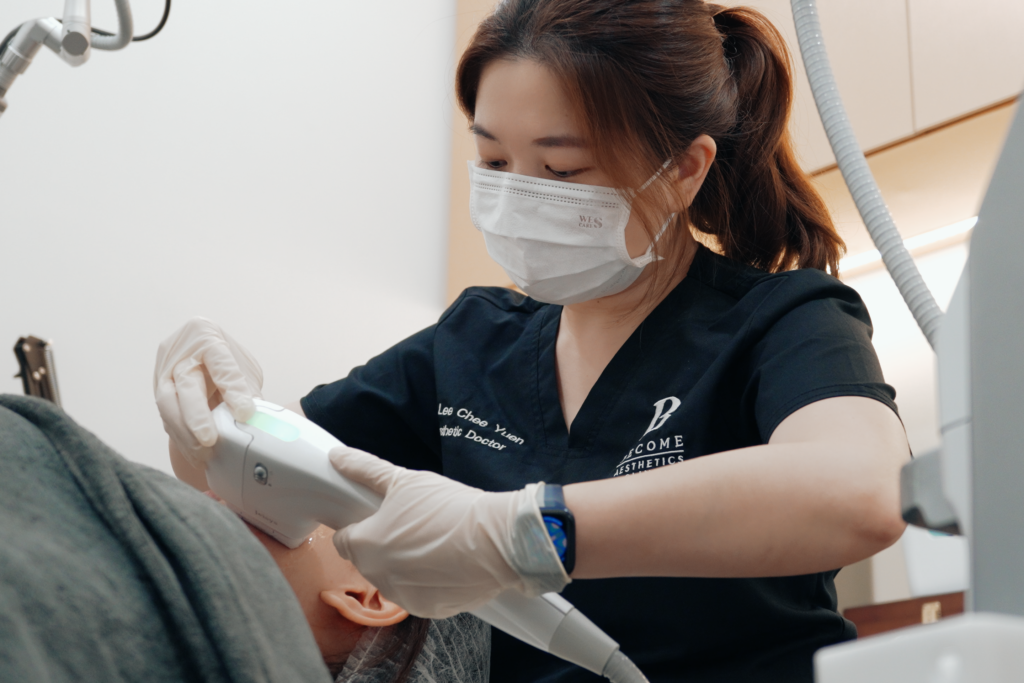 Doctor performing HIFU treatment on patient